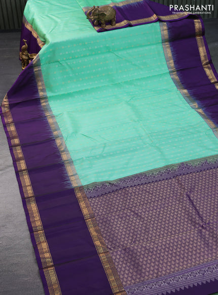 Pure soft silk saree teal green shade and violet with allover silver & gold zari woven butta weaves and long rettapet zari woven border