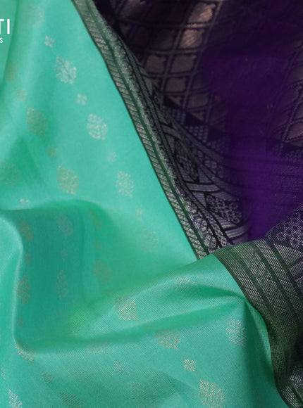 Pure soft silk saree teal green shade and violet with allover silver & gold zari woven butta weaves and long rettapet zari woven border