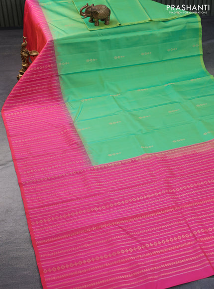 Pure soft silk saree dual shade of light green and dual shade of pinkish orange with zari woven buttas and long zari woven border