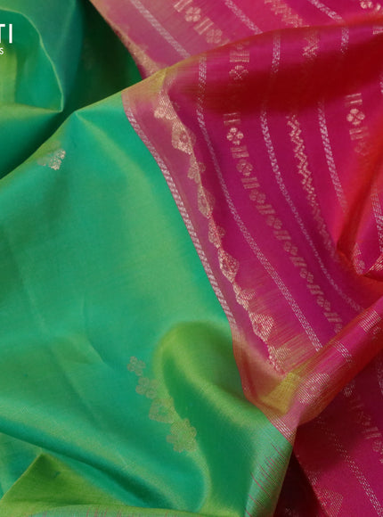 Pure soft silk saree dual shade of light green and dual shade of pinkish orange with zari woven buttas and long zari woven border