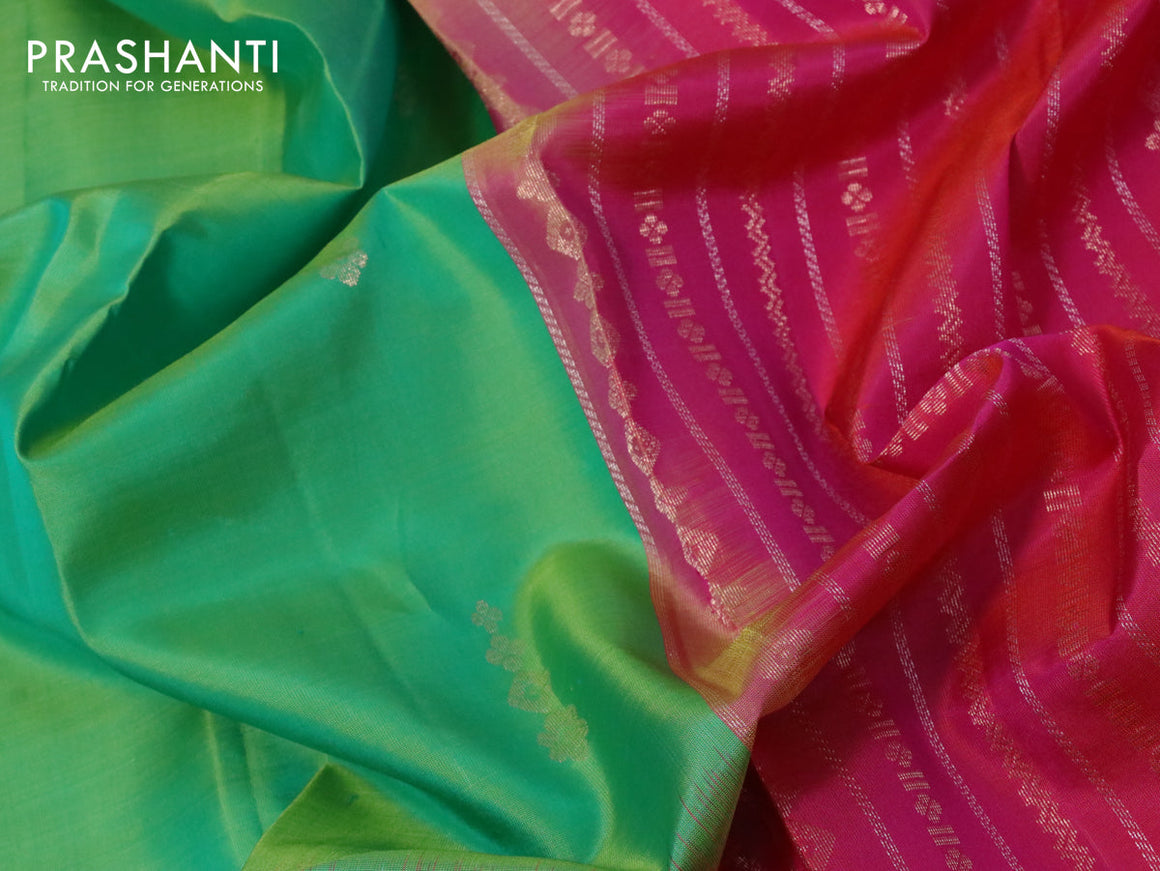 Pure soft silk saree dual shade of light green and dual shade of pinkish orange with zari woven buttas and long zari woven border