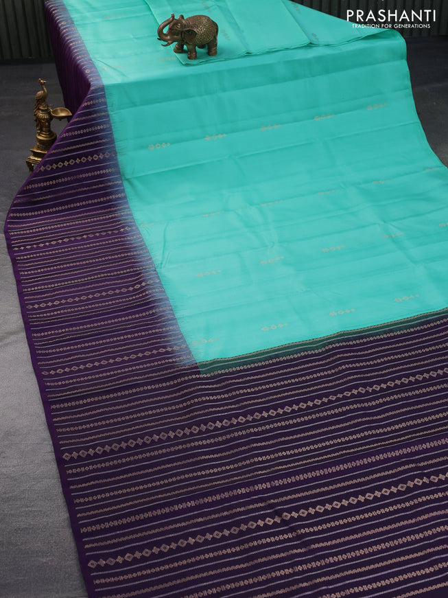 Pure soft silk saree teal blue shade and violet with zari woven buttas and long zari woven border