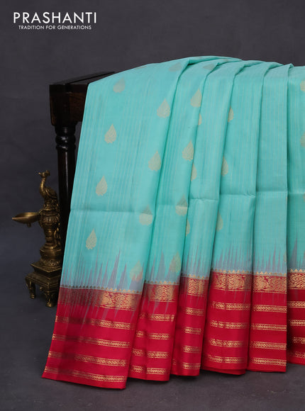 Pure soft silk saree teal blue and pink with allover zari weaves and zari woven border