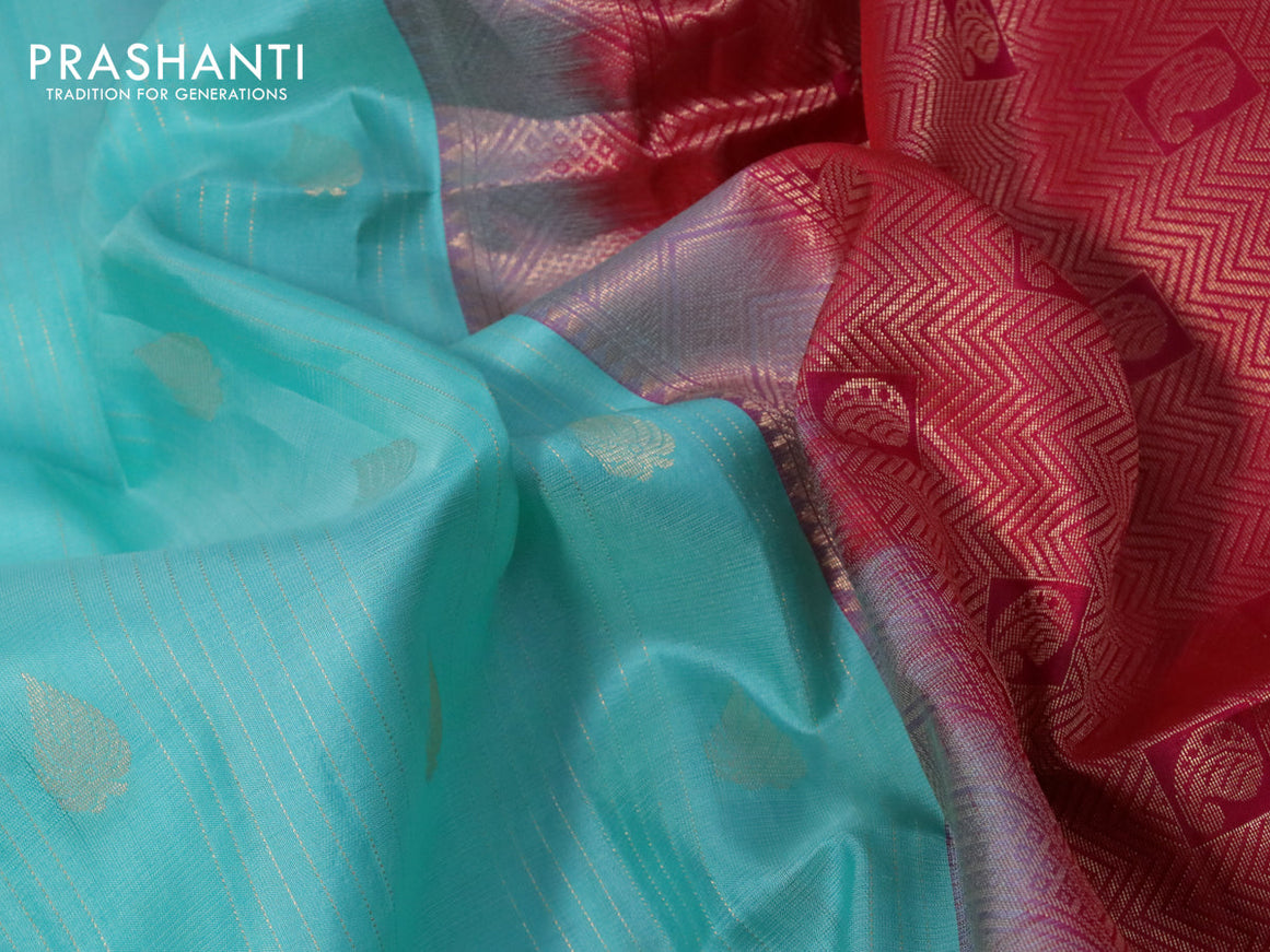 Pure soft silk saree teal blue and pink with allover zari weaves and zari woven border