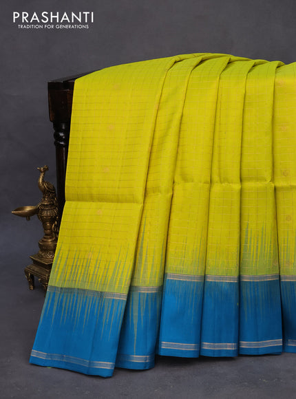 Pure soft silk saree yellow and cs blue with allover zari checks & buttas and rettapet zari woven border