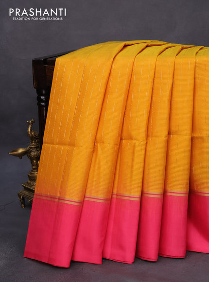 Pure soft silk saree mustard yellow and pink with allover zari weaves and zari woven simple border