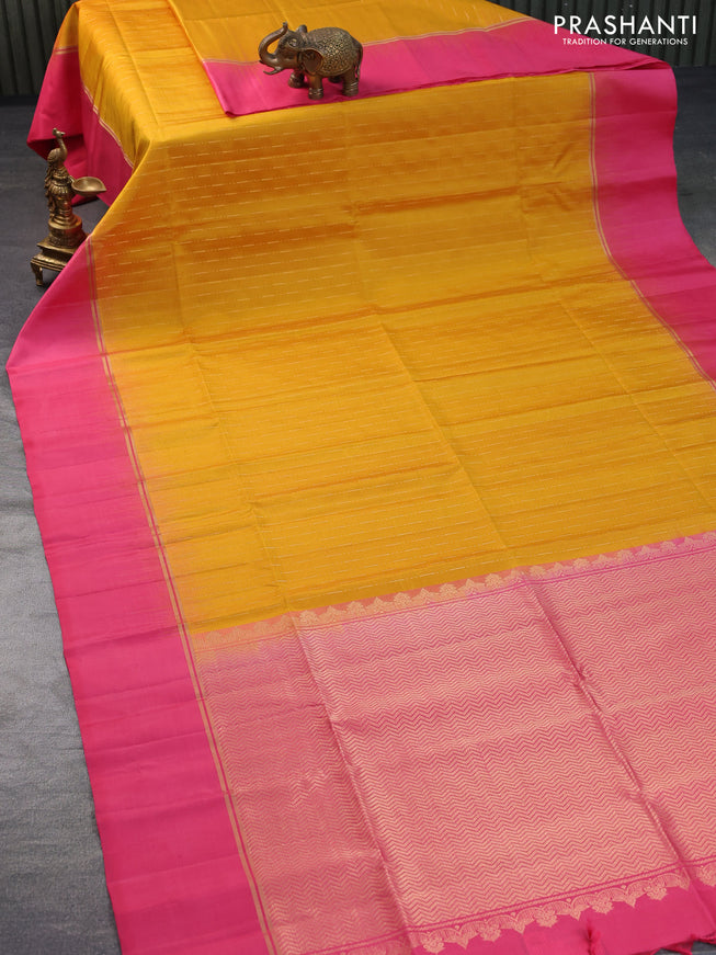 Pure soft silk saree mustard yellow and pink with allover zari weaves and zari woven simple border