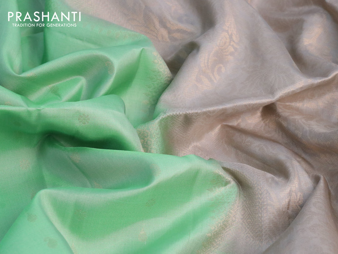 Pure soft silk saree pastel green and grey with allover zari woven buttas and zari woven simple border