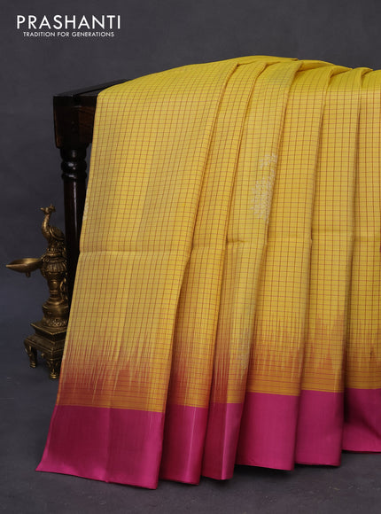 Pure soft silk saree yellow and pink with allover checked pattern & silver zari woven buttas and simple border