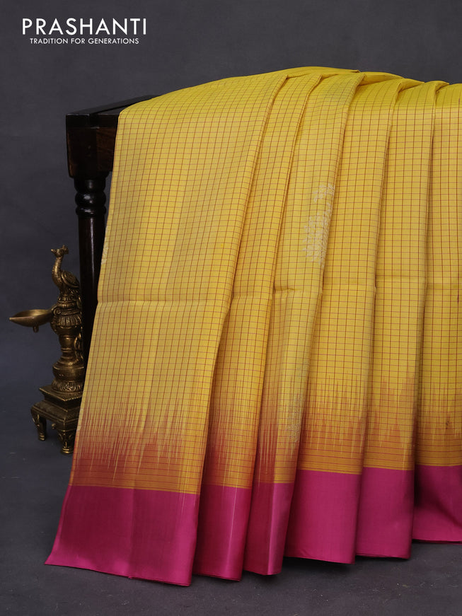 Pure soft silk saree yellow and pink with allover checked pattern & silver zari woven buttas and simple border