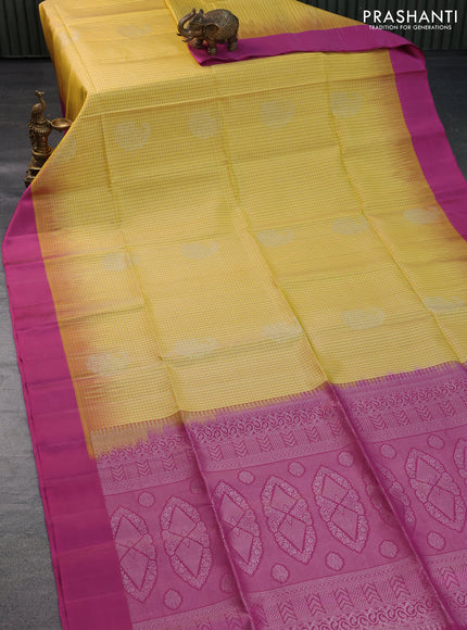 Pure soft silk saree yellow and pink with allover checked pattern & silver zari woven buttas and simple border