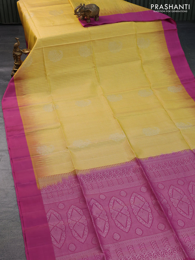 Pure soft silk saree yellow and pink with allover checked pattern & silver zari woven buttas and simple border