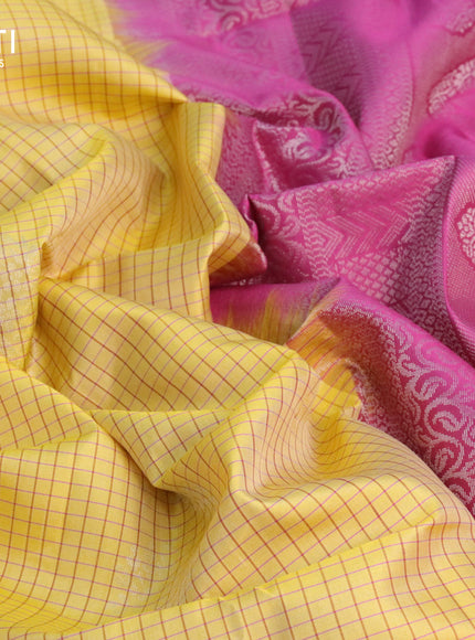 Pure soft silk saree yellow and pink with allover checked pattern & silver zari woven buttas and simple border