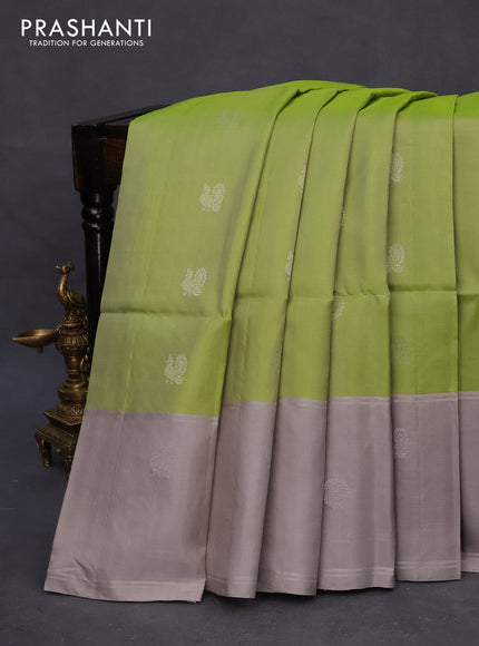 Pure soft silk saree light green and grey with silver zari woven buttas and long silver zari woven butta border