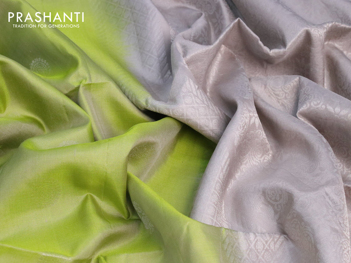 Pure soft silk saree light green and grey with silver zari woven buttas and long silver zari woven butta border