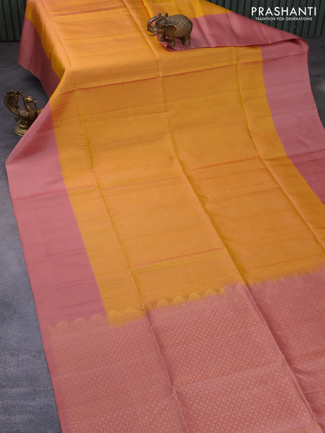 Pure soft silk saree yellow and peach shade with allover zari weaves and simple border