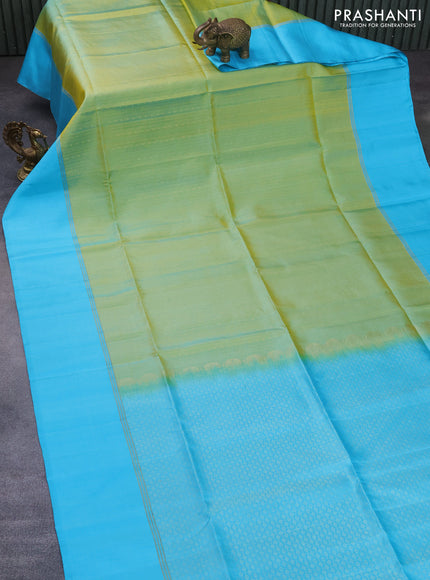 Pure soft silk saree green shade and light blue with allover zari weaves and zari woven simple border