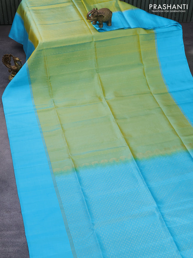 Pure soft silk saree green shade and light blue with allover zari weaves and zari woven simple border