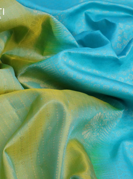 Pure soft silk saree green shade and light blue with allover zari weaves and zari woven simple border