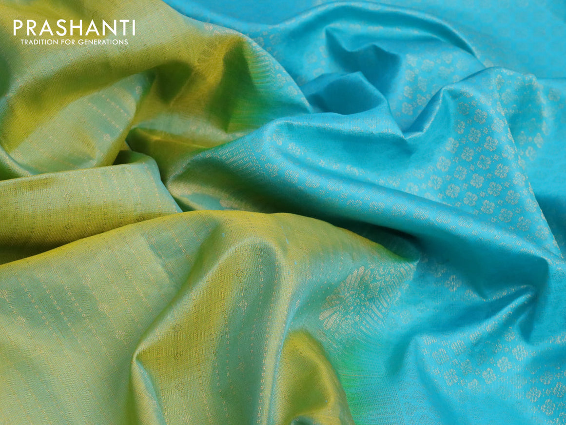 Pure soft silk saree green shade and light blue with allover zari weaves and zari woven simple border