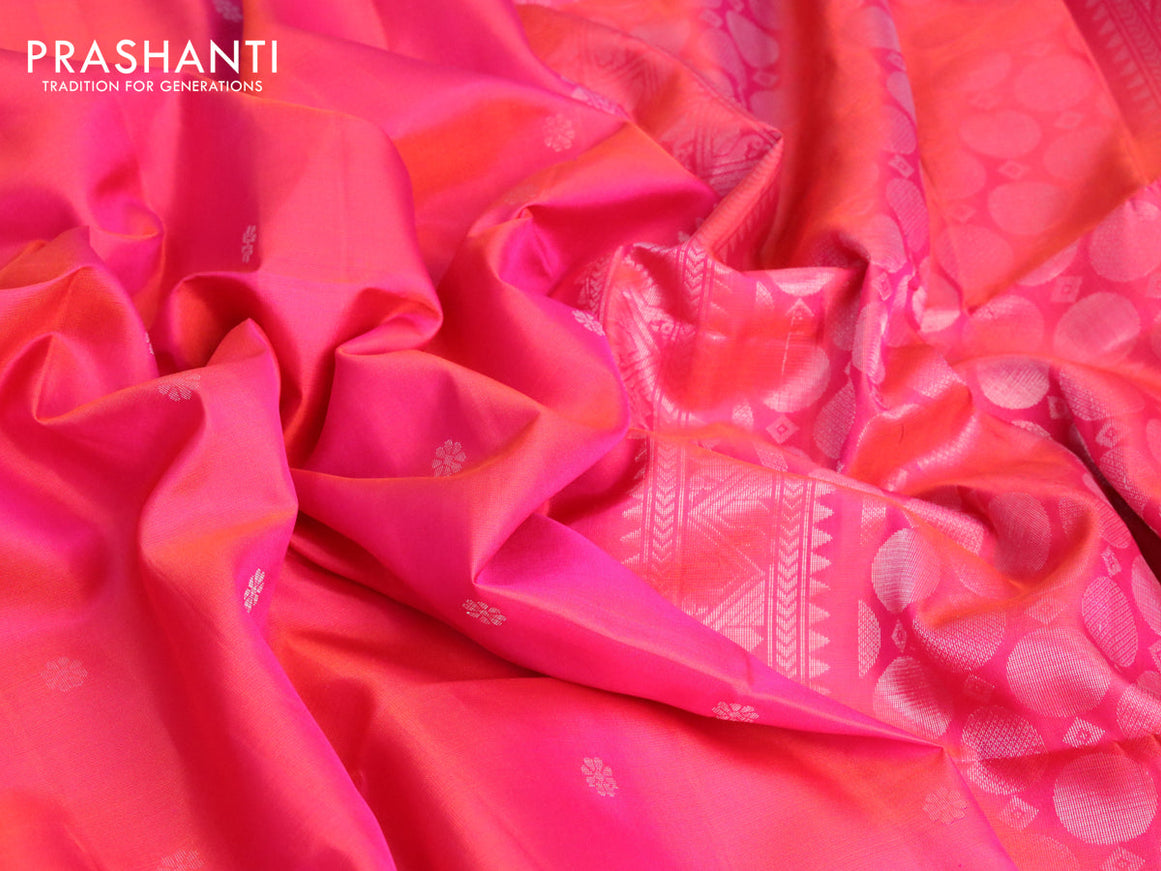 Pure soft silk saree dual shade of pinkish orange with silver zari woven buttas and rettapet zari woven border