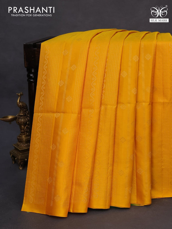 Pure soft silk saree mango yellow and dark green with allover zari weaves in borderless style