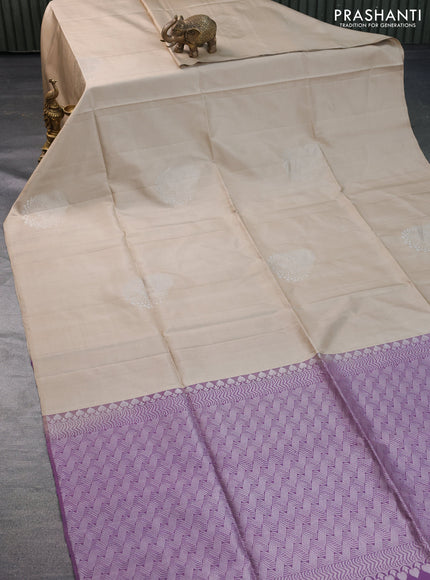 Pure soft silk saree beige and pastel lavender shade with silver zari woven buttas in borderless style