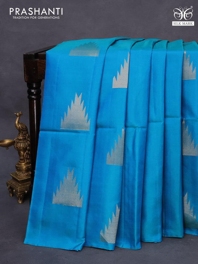 Pure soft silk saree dual shade of cs blue with temple zari woven buttas in borderless style