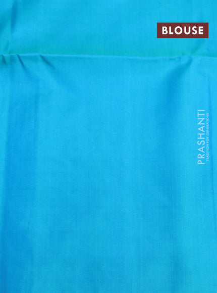 Pure soft silk saree dual shade of cs blue with temple zari woven buttas in borderless style