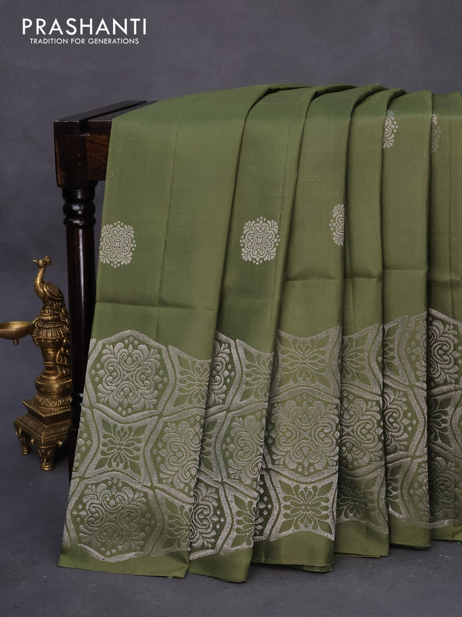 Pure soft silk saree green shade with silver zari woven buttas and rich silver zari woven border