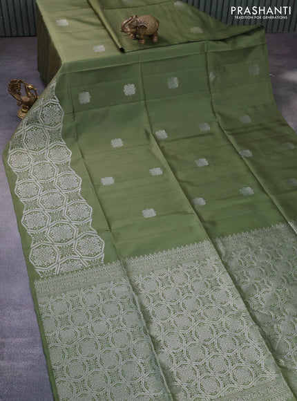 Pure soft silk saree green shade with silver zari woven buttas and rich silver zari woven border