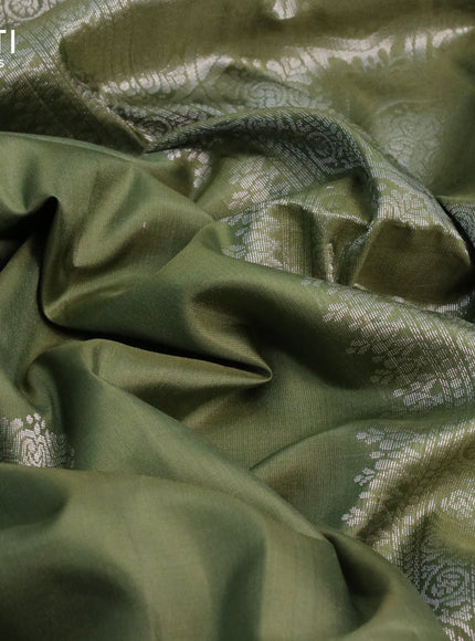 Pure soft silk saree green shade with silver zari woven buttas and rich silver zari woven border