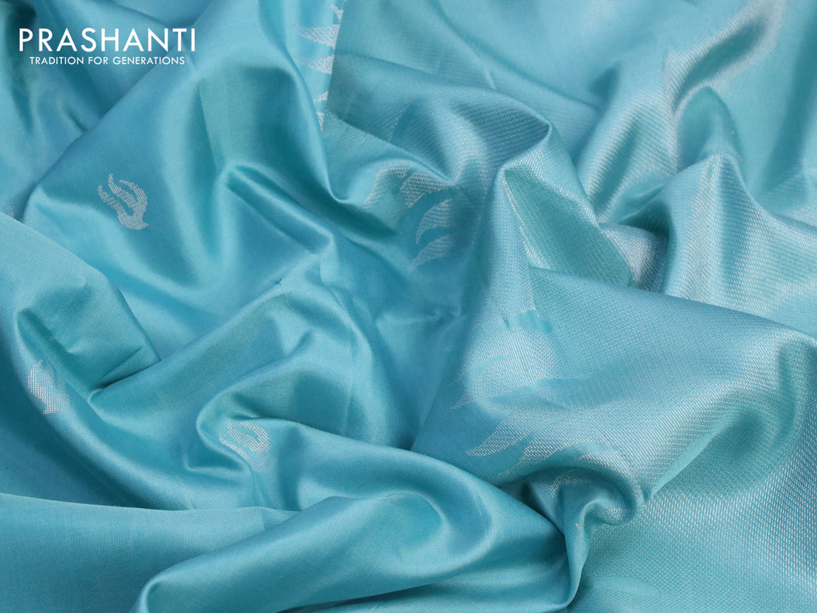 Pure soft silk saree teal blue with silver zari woven buttas and long silver zari woven border