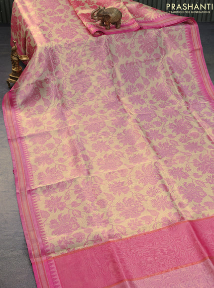 Tissue saree beige and pink with allover floral digital prints and temple design zari woven border