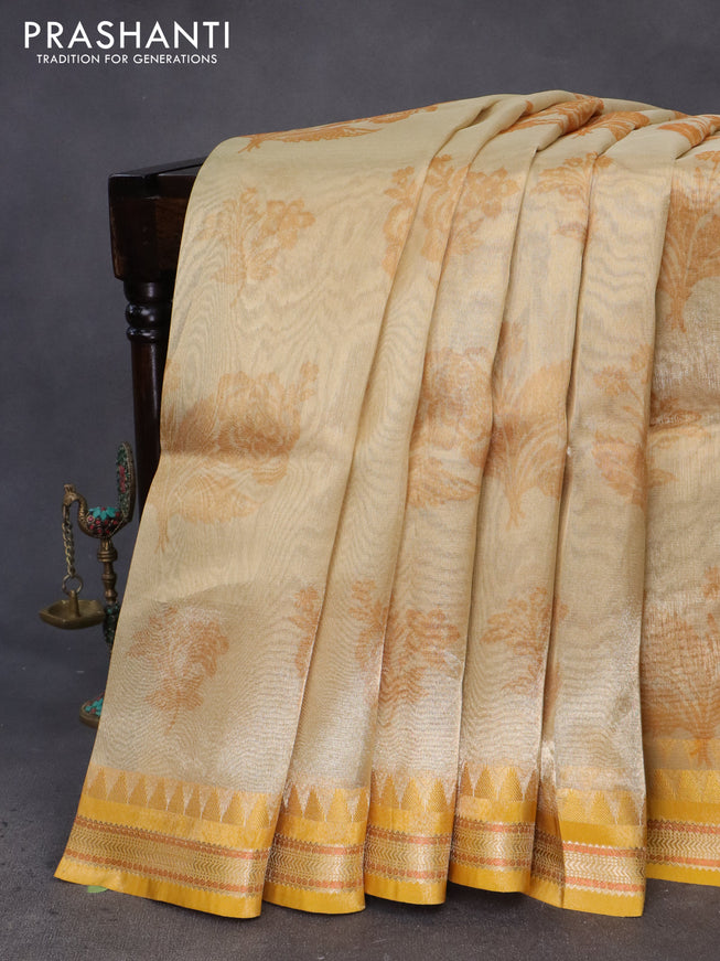 Tissue saree sandal and mustard yellow with allover floral digital prints and temple design zari woven border