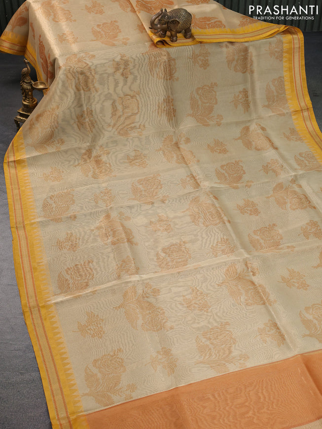 Tissue saree sandal and mustard yellow with allover floral digital prints and temple design zari woven border