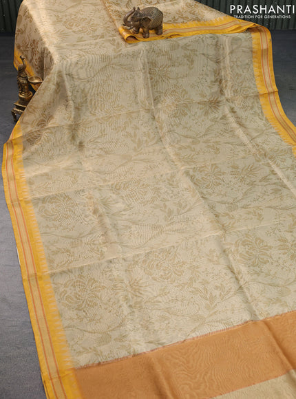 Tissue saree beige and mustard yellow with allover digital prints and temple design zari woven border