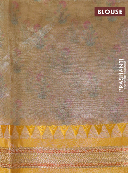 Tissue saree beige and mustard yellow with allover digital prints and temple design zari woven border