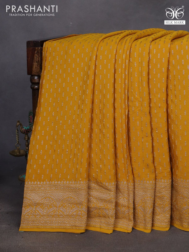 Banarasi crepe saree mustard yellow with allover thread & zari woven buttas and woven border