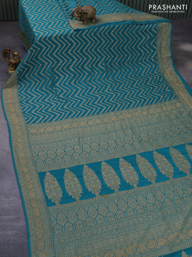 Banarasi crepe saree teal green with allover thread & zari zig zag weaves and woven border