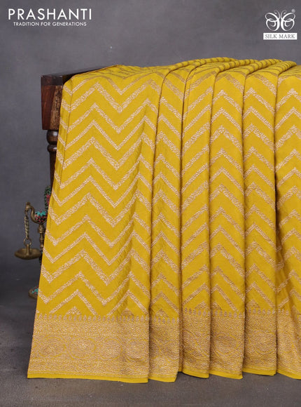 Banarasi crepe saree mustard shade with allover thread & zari zig zag weaves and woven border