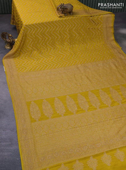 Banarasi crepe saree mustard shade with allover thread & zari zig zag weaves and woven border