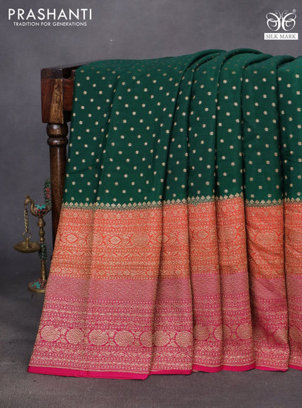 Banarasi crepe saree dark green and orange pink with allover thread & zari woven buttas and long woven border