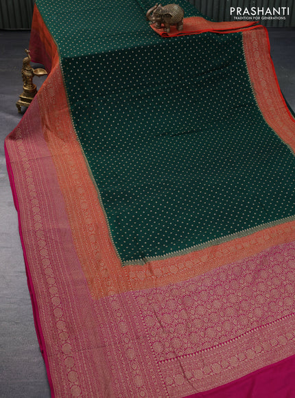 Banarasi crepe saree dark green and orange pink with allover thread & zari woven buttas and long woven border