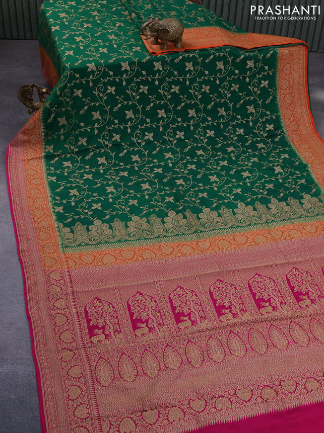 Banarasi crepe saree green and orange pink with allover thread & zari weaves and woven border