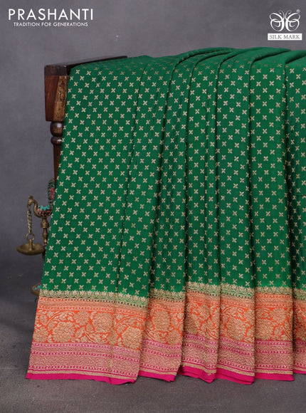 Banarasi crepe saree green and orange pink with allover thread & zari woven butta weaves and woven border