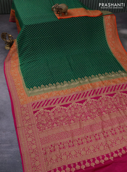 Banarasi crepe saree green and orange pink with allover thread & zari woven butta weaves and woven border