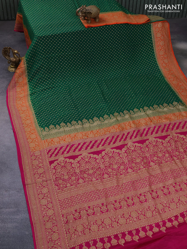 Banarasi crepe saree green and orange pink with allover thread & zari woven butta weaves and woven border