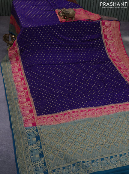 Banarasi crepe saree blue and pink peacock blue with allover thread & zari woven butta weaves and long woven border