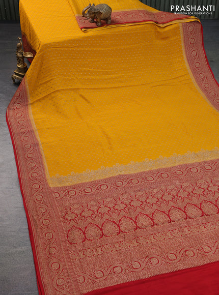 Banarasi crepe saree mango yellow and red with allover thread & zari woven butta weaves and woven border